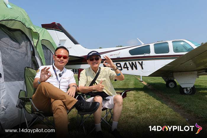 Capt. Gema and family camping under the wing of their aircraft during EAA AirVenture Oshkosh experience