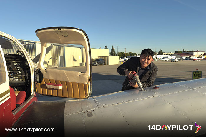 14DAYPILOT student refueling the aircraft pre-flight.