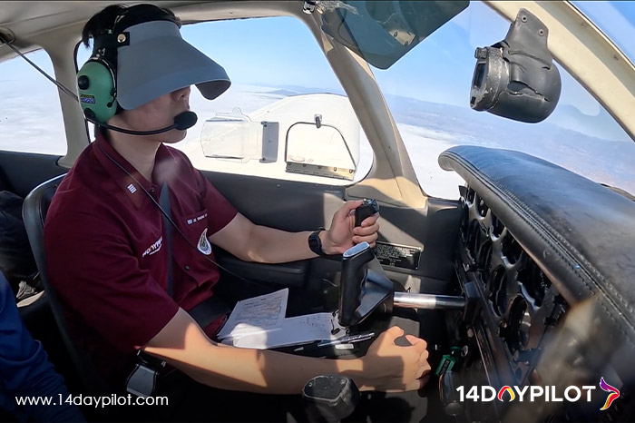 Aspiring pilot undergoing instrument rating training in a real aircraft cockpit.