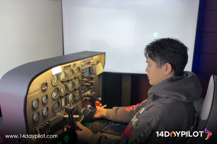 14DAYPILOT student practicing flight procedures using an AATD simulator.