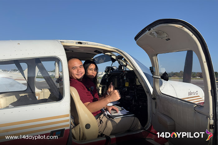 Flight instructor and student inside training cockpit